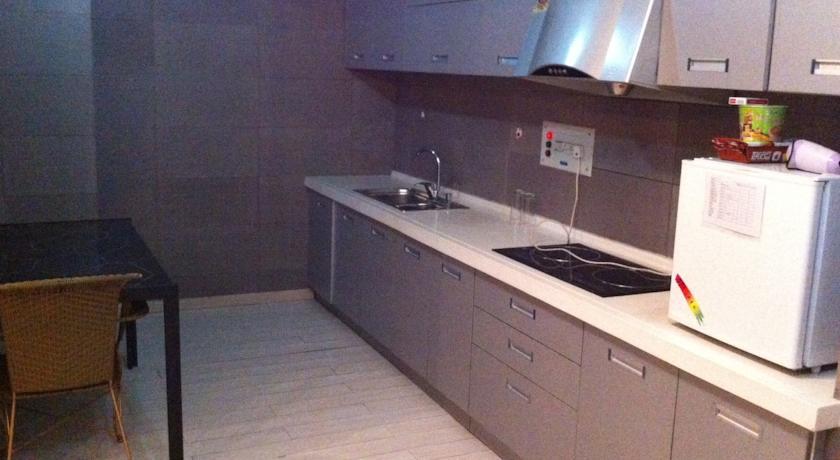 Nissi Holiday Hotel Kunming Quarto foto
