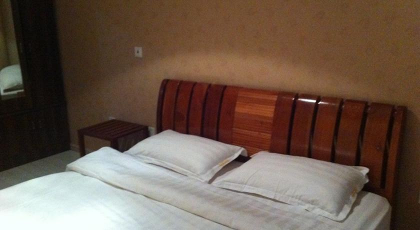 Nissi Holiday Hotel Kunming Quarto foto